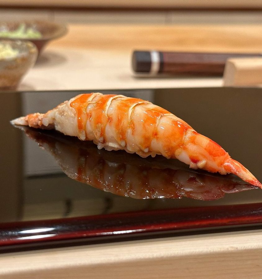 Kuruma prawn nigiri on a sushi counter